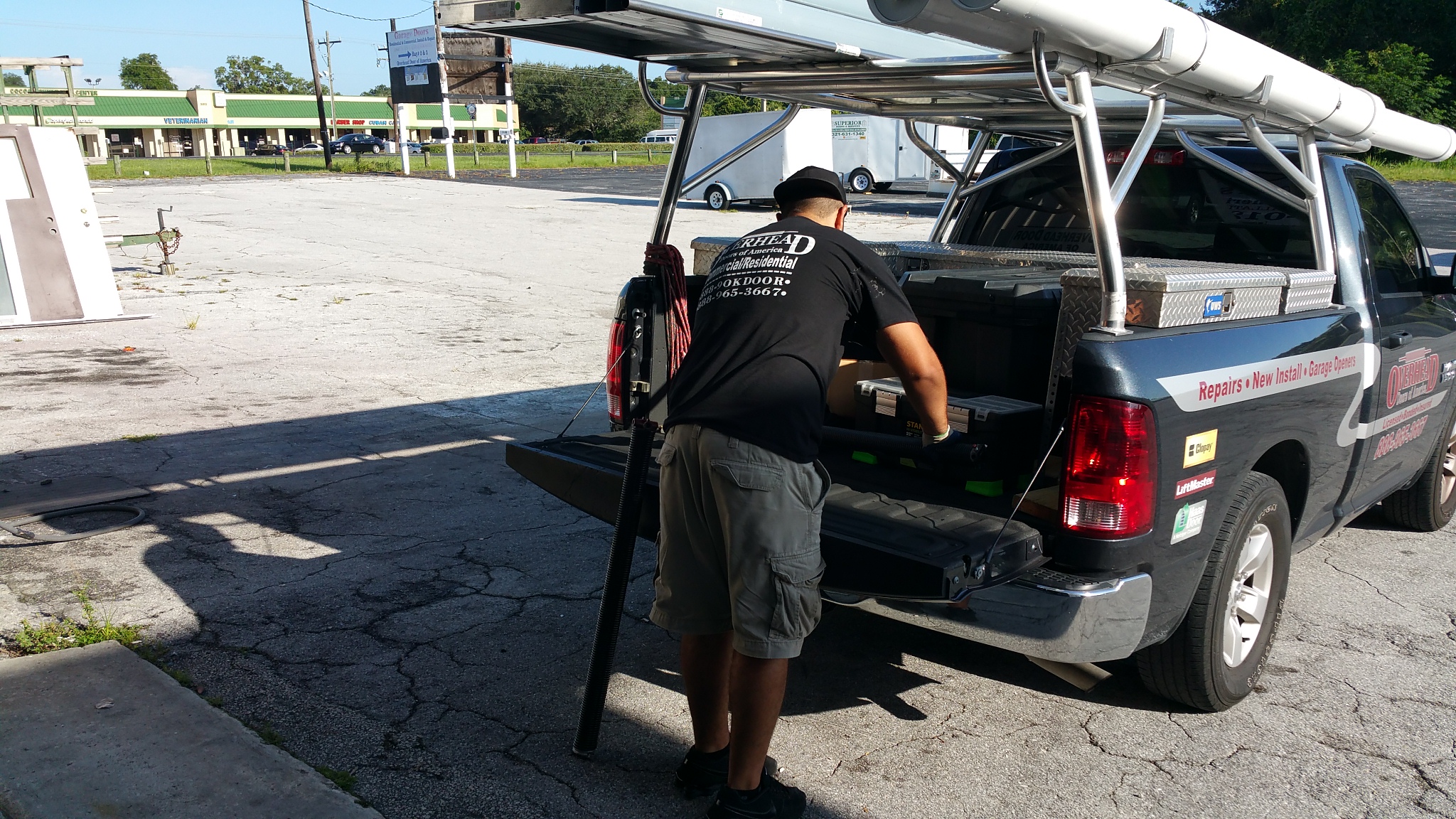 Overhead Door of America technician providing garage door service